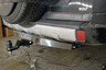 Фаркоп ТСС оцинкованный под американский квадрат для Mitsubishi Pajero IV 2006-2022 с накладкой из нержавеющей стали. Артикул TCU00085