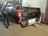 Фаркоп Bizon для Mitsubishi L200 IV 2006-2015 с накладкой из нержавеющей стали. Быстросъемный крюк. Артикул FA 0648-E(N)