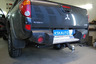 Фаркоп Bizon для Mitsubishi L200 IV 2006-2015 с накладкой из нержавеющей стали. Быстросъемный крюк. Артикул FA 0648-E(N)